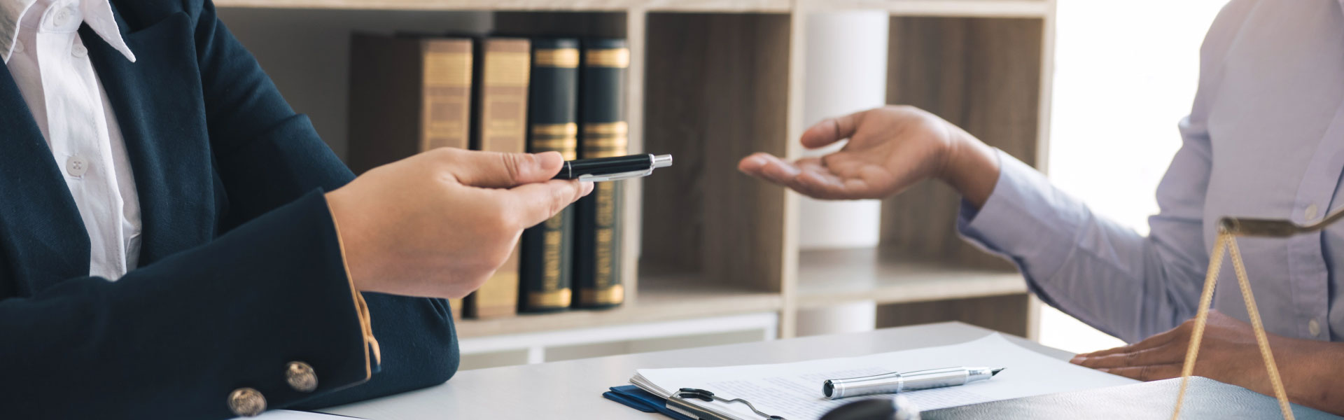 Personal injury attorney signing an injury case
